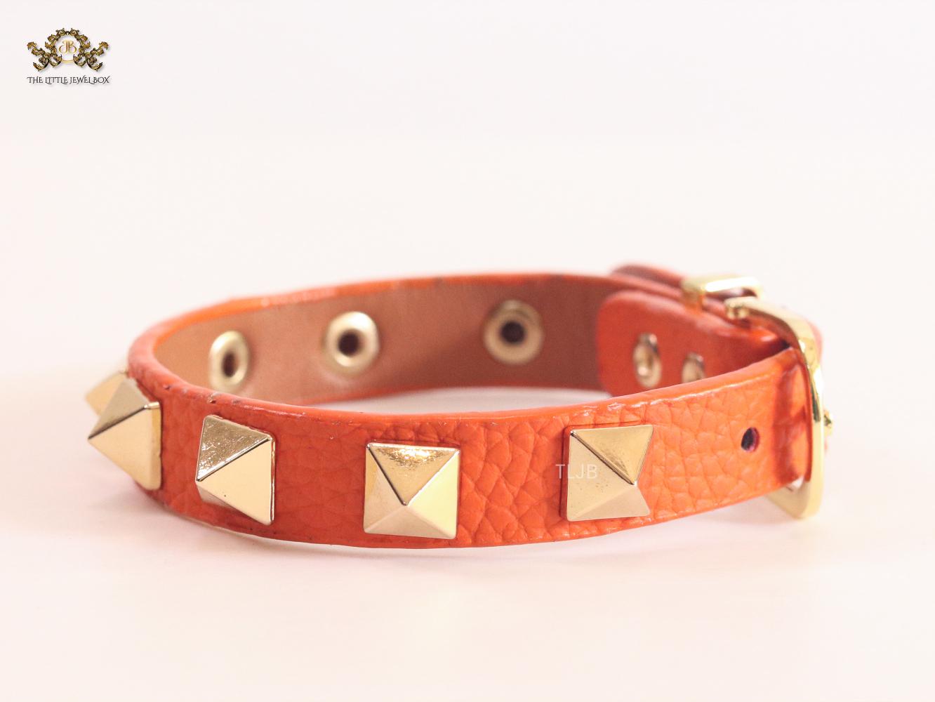 Alphabet V rockstud orange bracelet