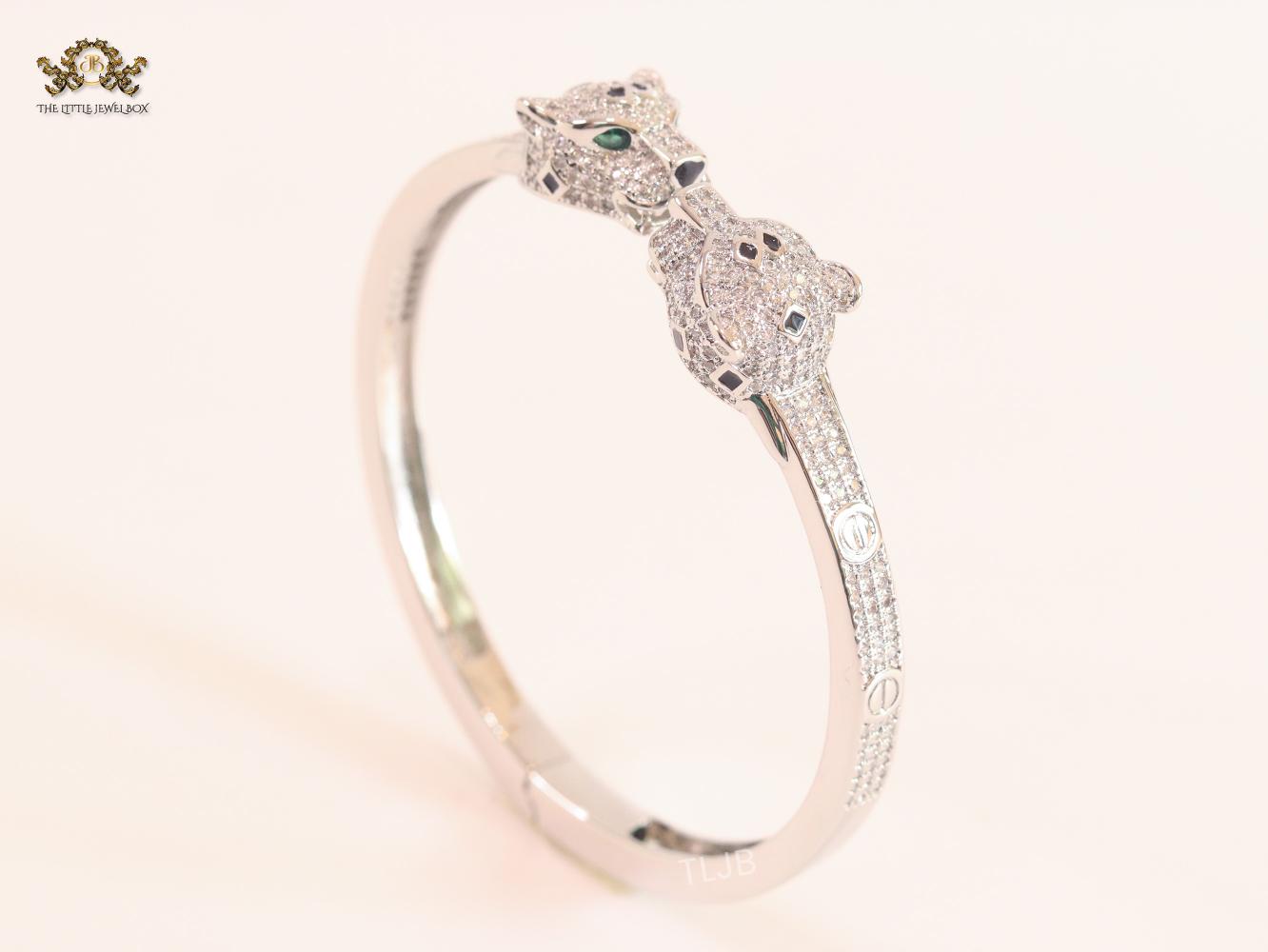 Panther heads platinum plated and emerald bracelet
