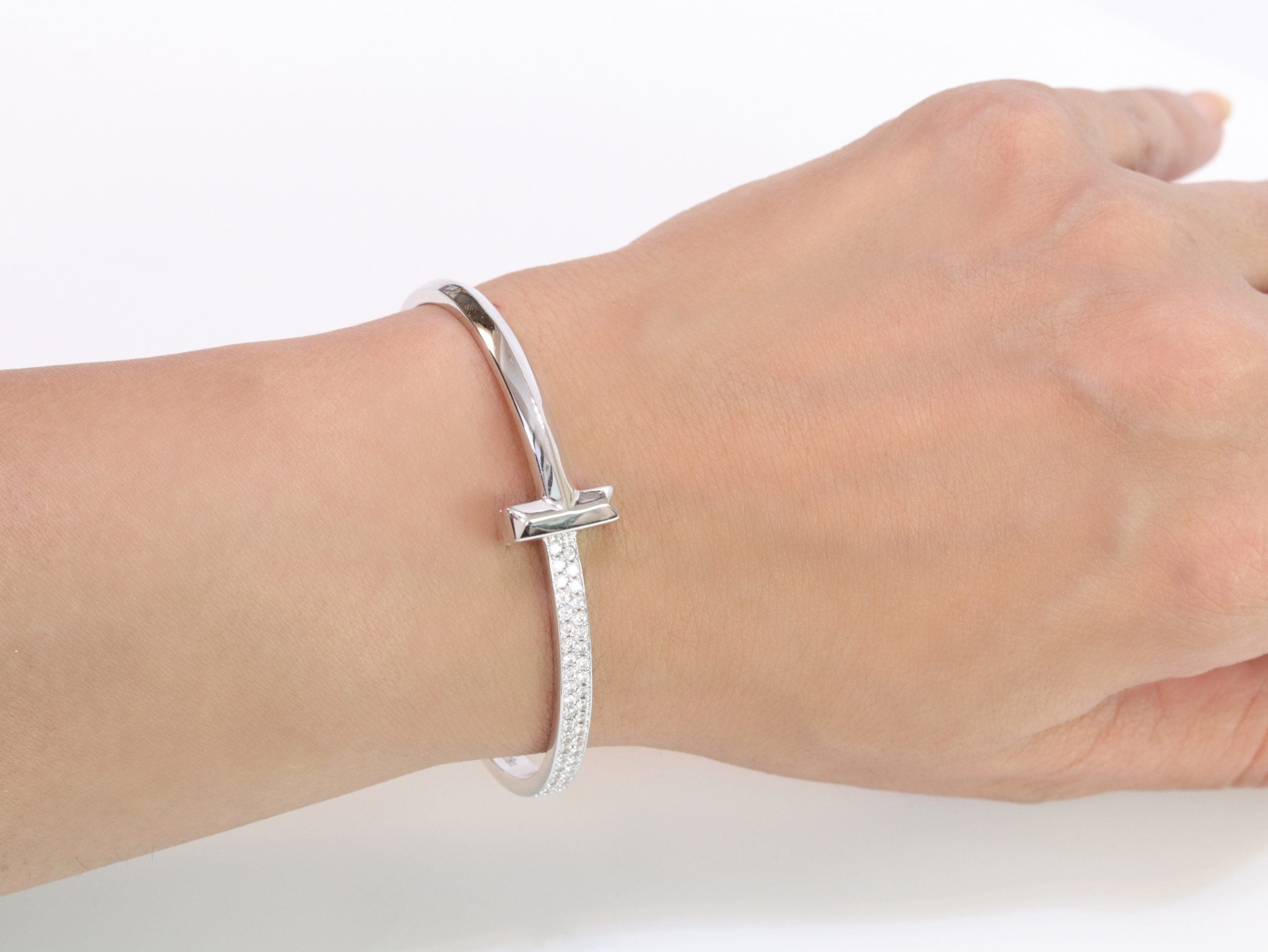 Alphabet T bracelet with half CZ in platinum finish