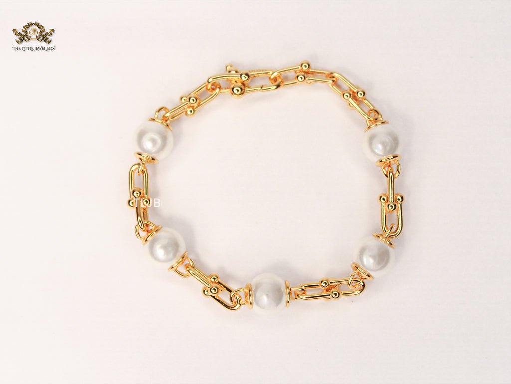 Gold and pearl Tiff & Co linked chain bracelet