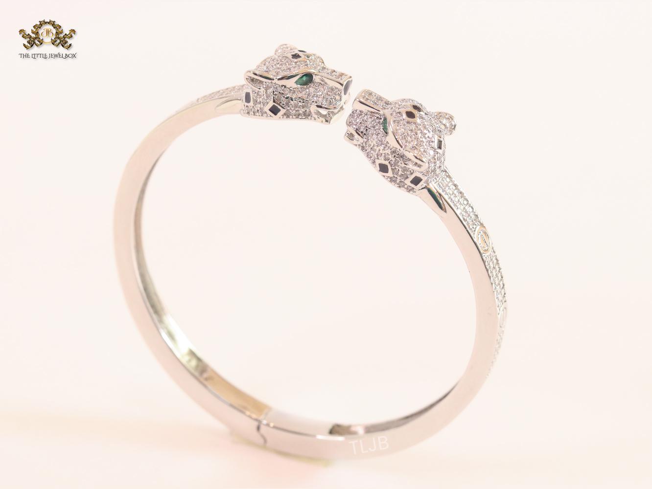 Panther heads platinum plated and emerald bracelet