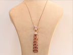 Rose gold panther face sleek tassel pendant