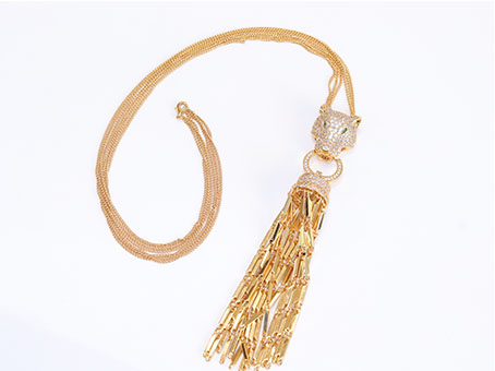 Gold panther face sleek tassel pendant