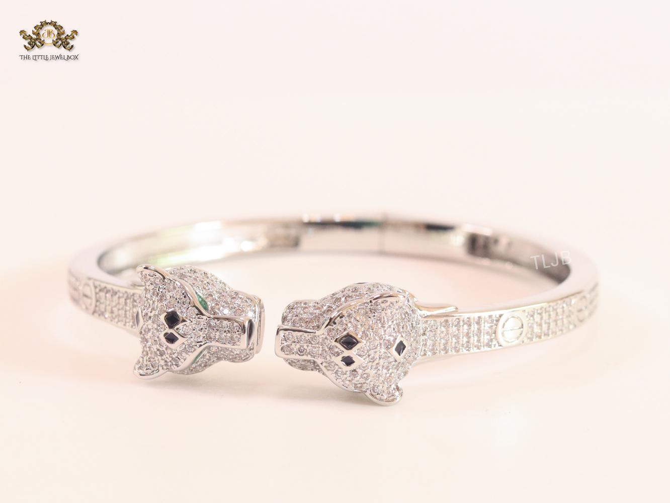 Panther heads platinum plated and emerald bracelet