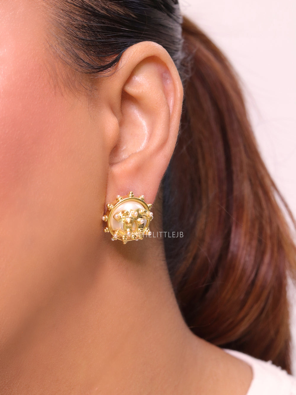 Double C gold spiked studs