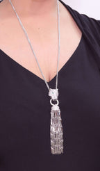 Platinum panther face sleek tassel pendant
