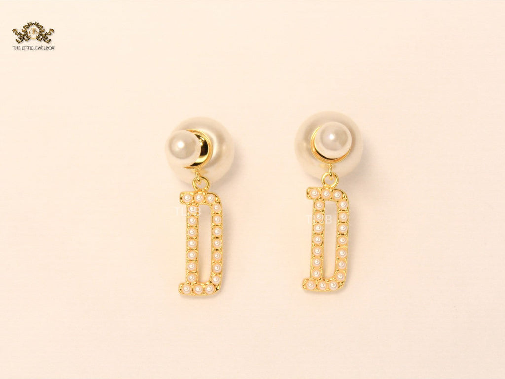 alphabet D pearl studded bomber earrings