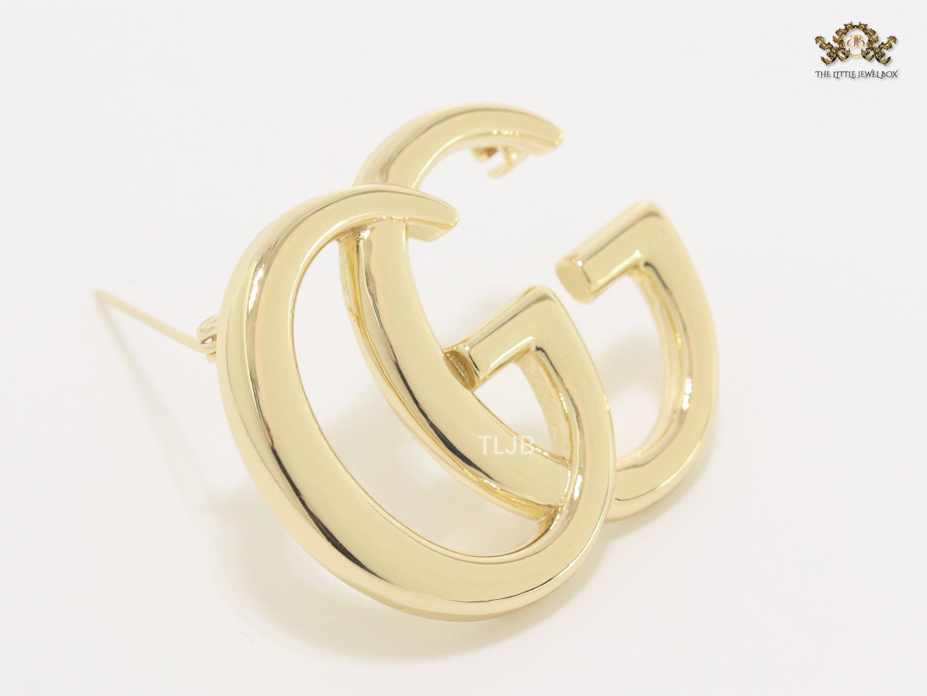 Double G Brooch in shiny Gold