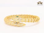 Gold serpentine and cz bracelet