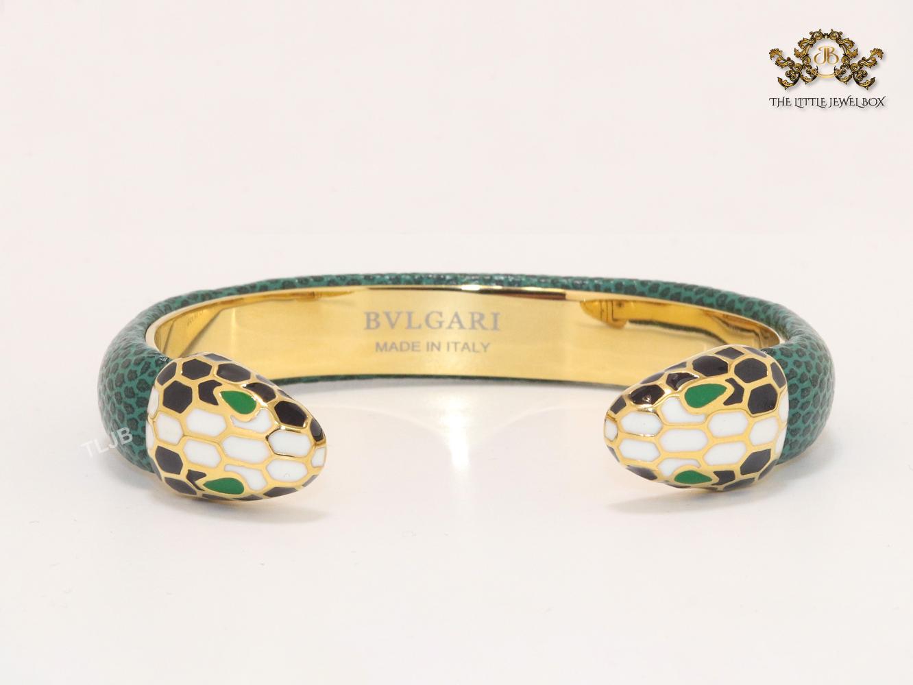 Two snake head green leather bracelet