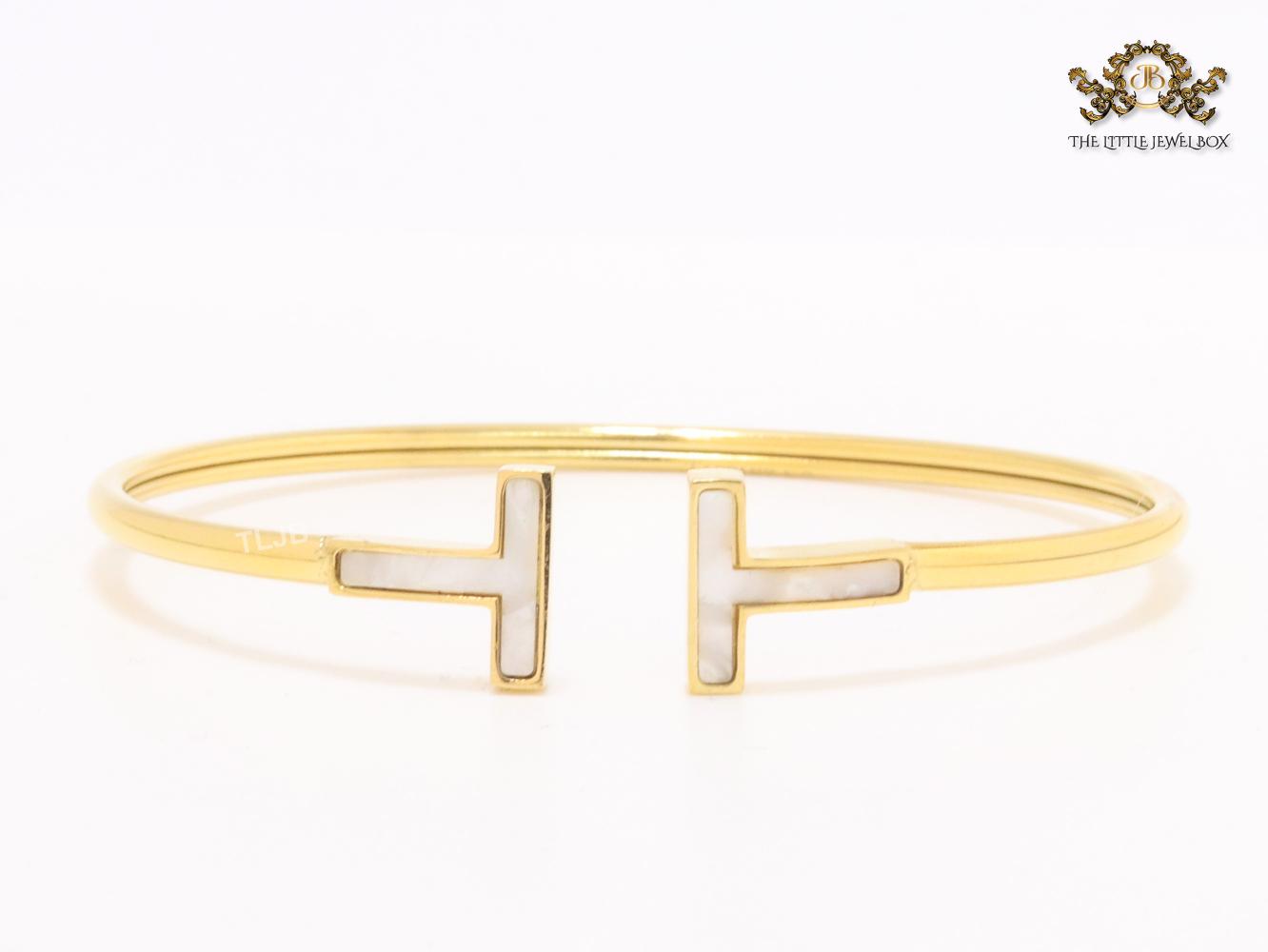 Alphabet T MOP and gold sleek bracelet