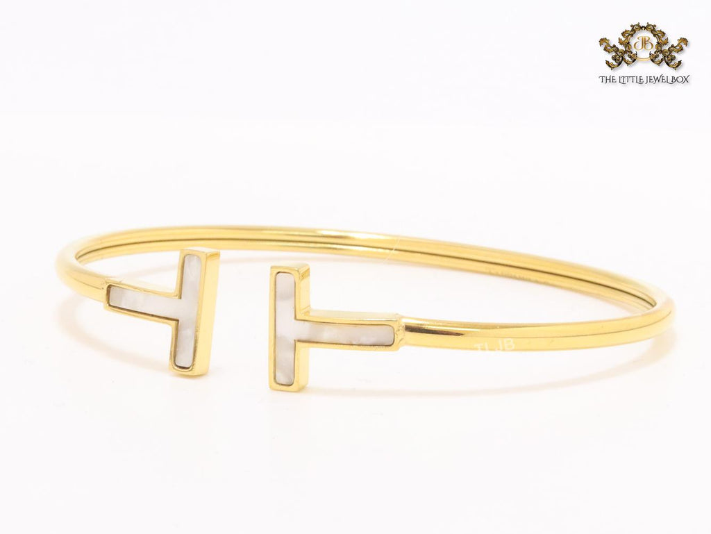 Alphabet T MOP and gold sleek bracelet
