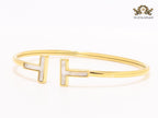 Alphabet T MOP and gold sleek bracelet