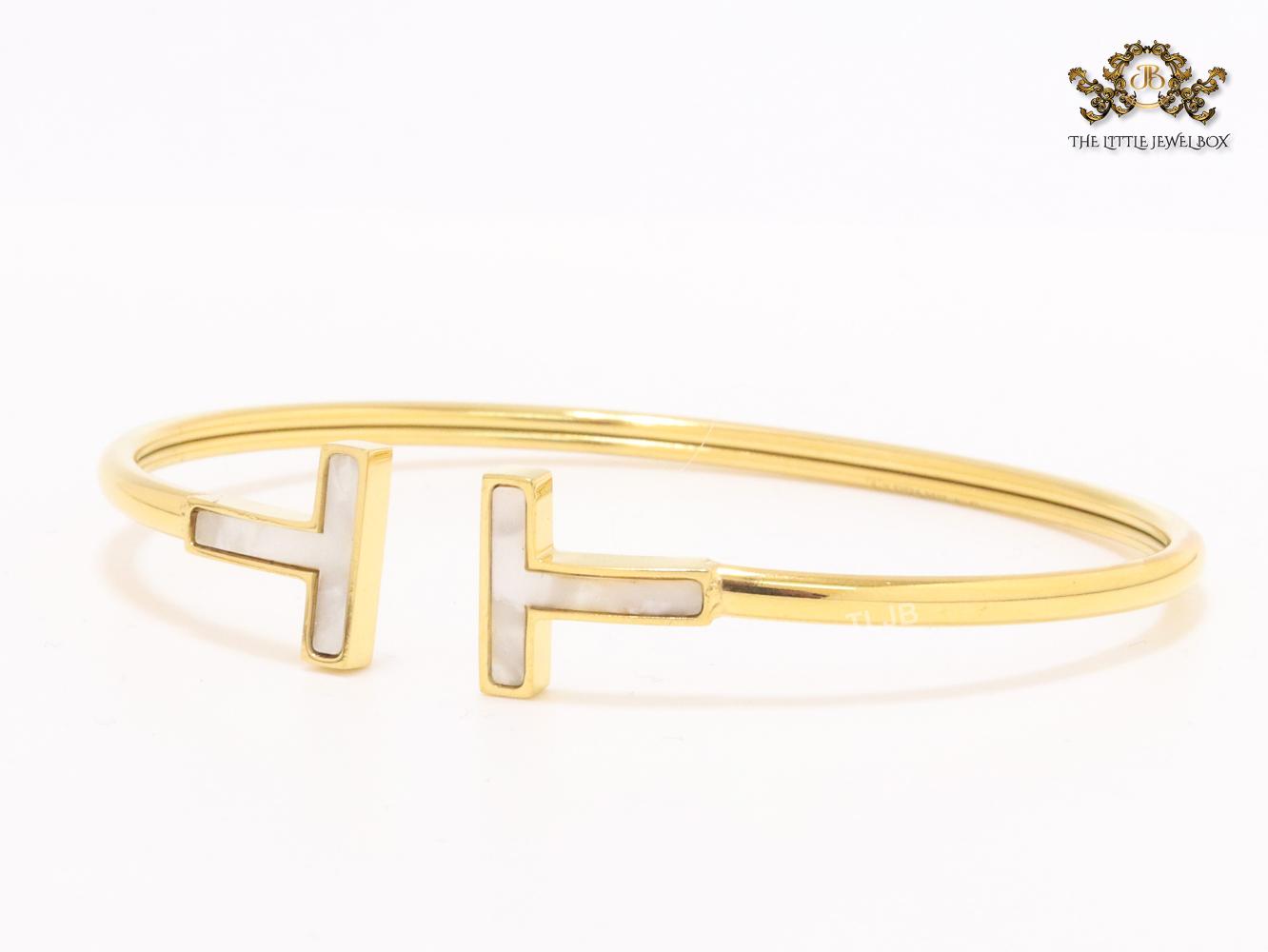 Alphabet T MOP and gold sleek bracelet