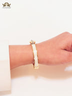 Alphabet H seek bracelet with white print