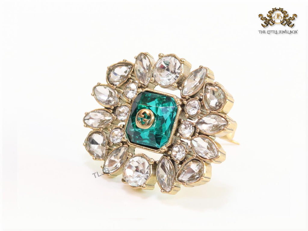 Emerald green stone and double G cz brooch