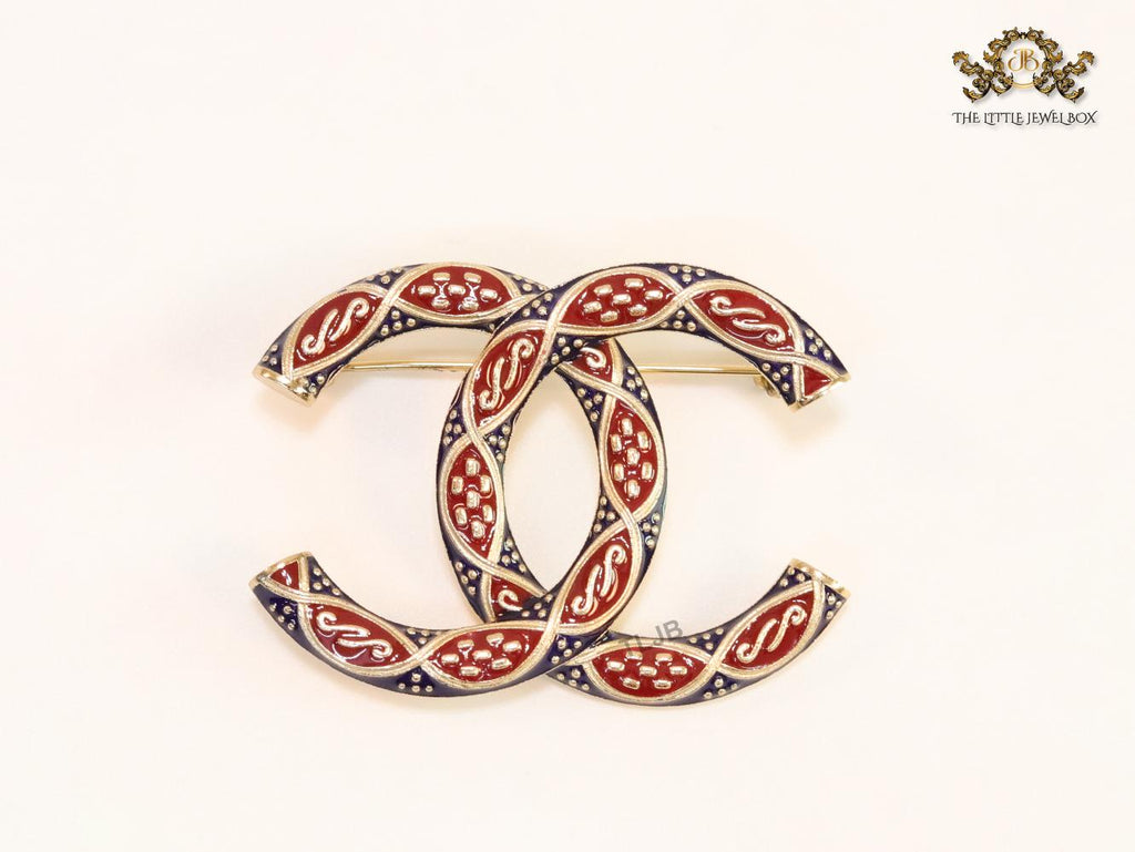 Double C red and blue embossed gold Brooch