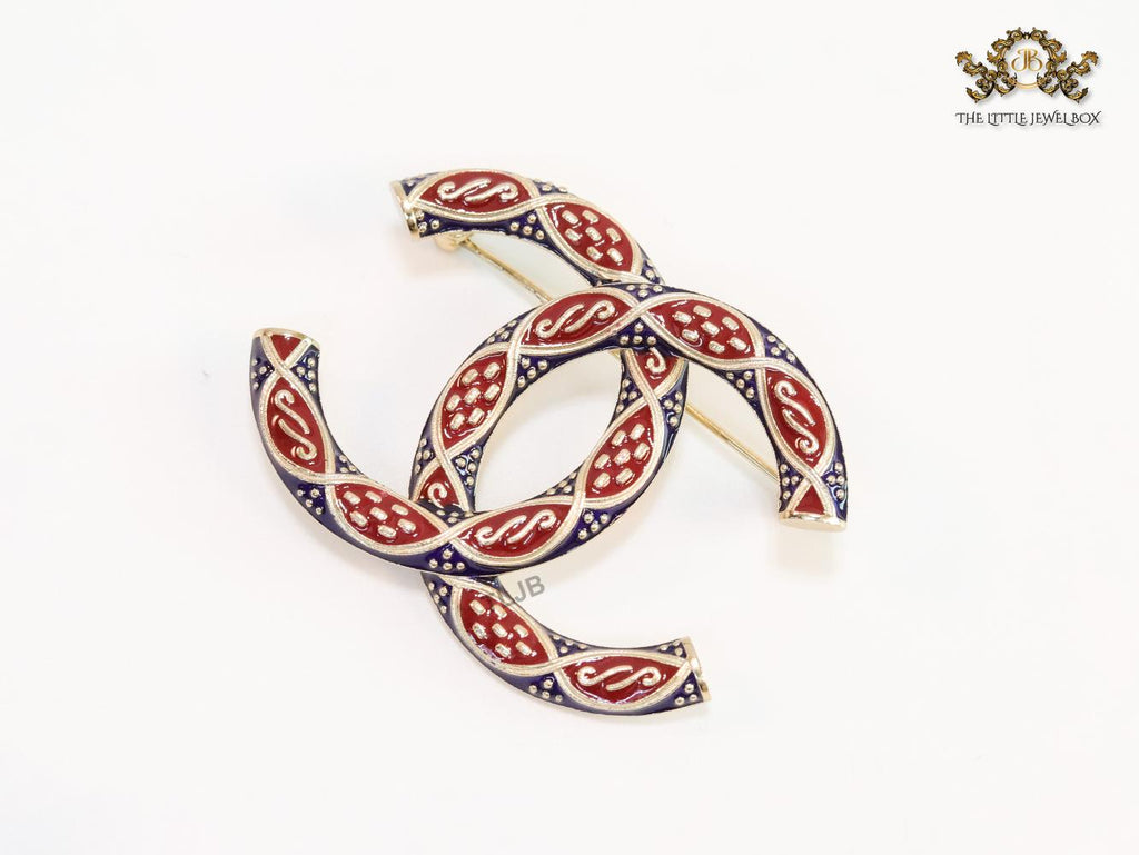 Double C red and blue embossed gold Brooch
