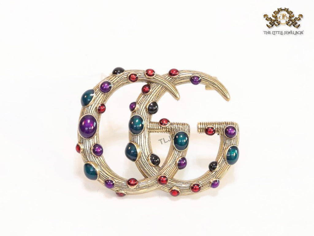 Rustic twin G brooch with multi coloured stones