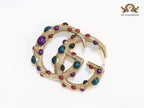 Rustic twin G brooch with multi coloured stones