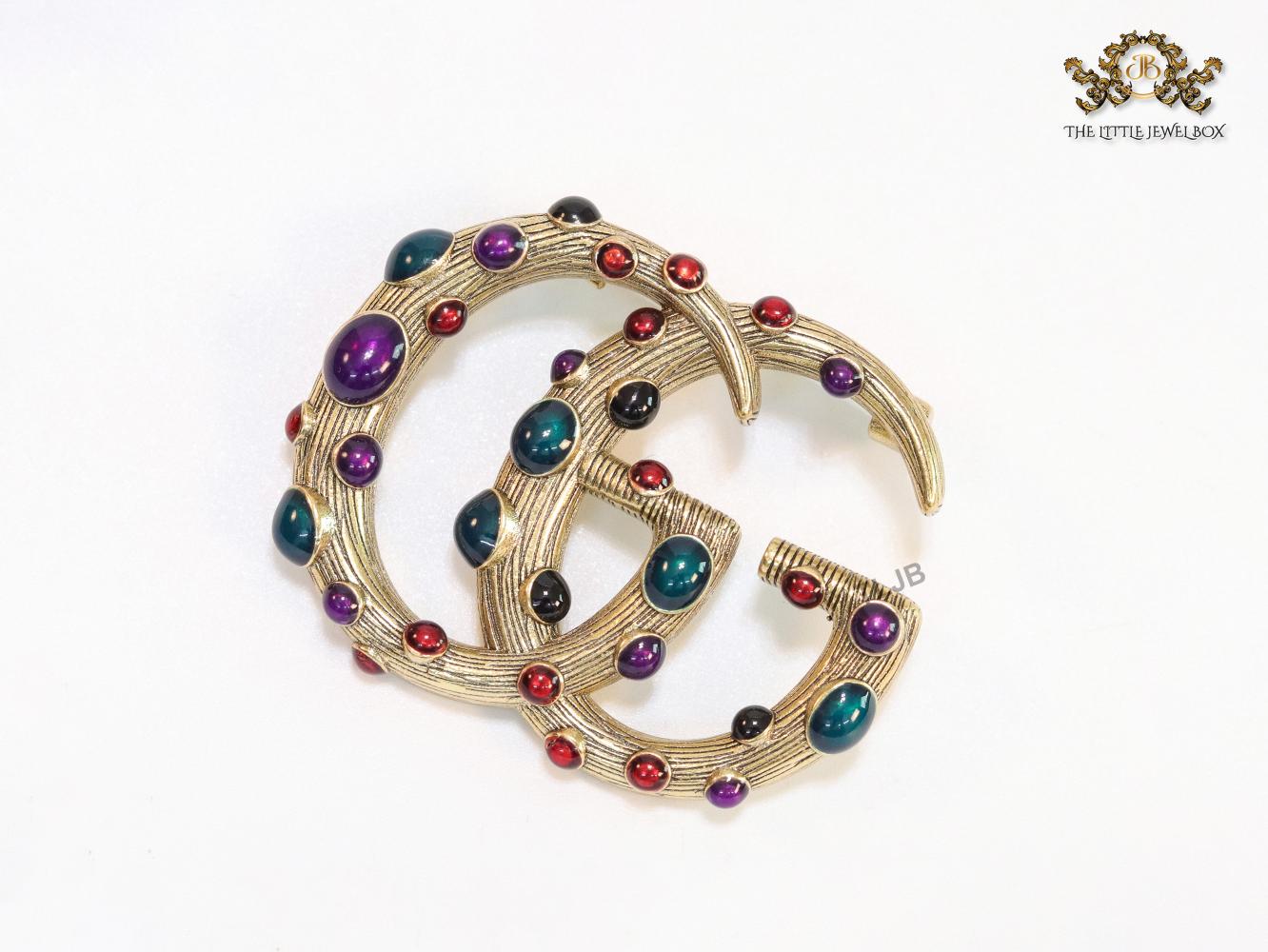 Rustic twin G brooch with multi coloured stones