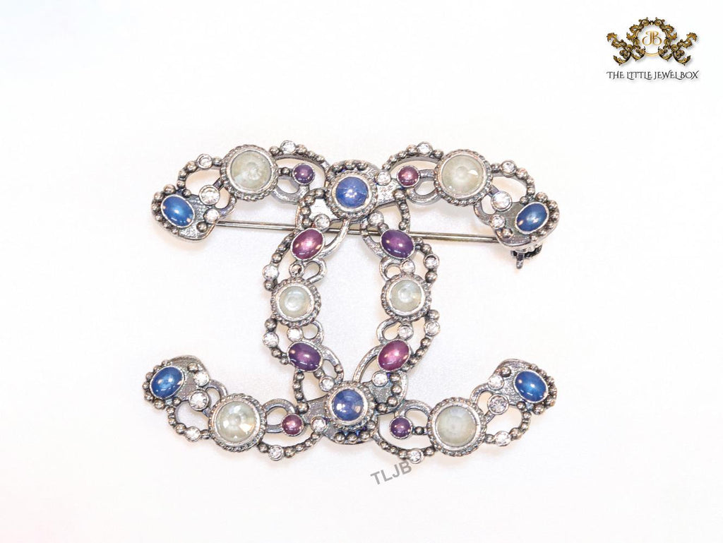 Antique platinum finish double C brooch with multi coloured stones