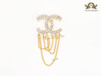 Double C gold and cz brooch with chains