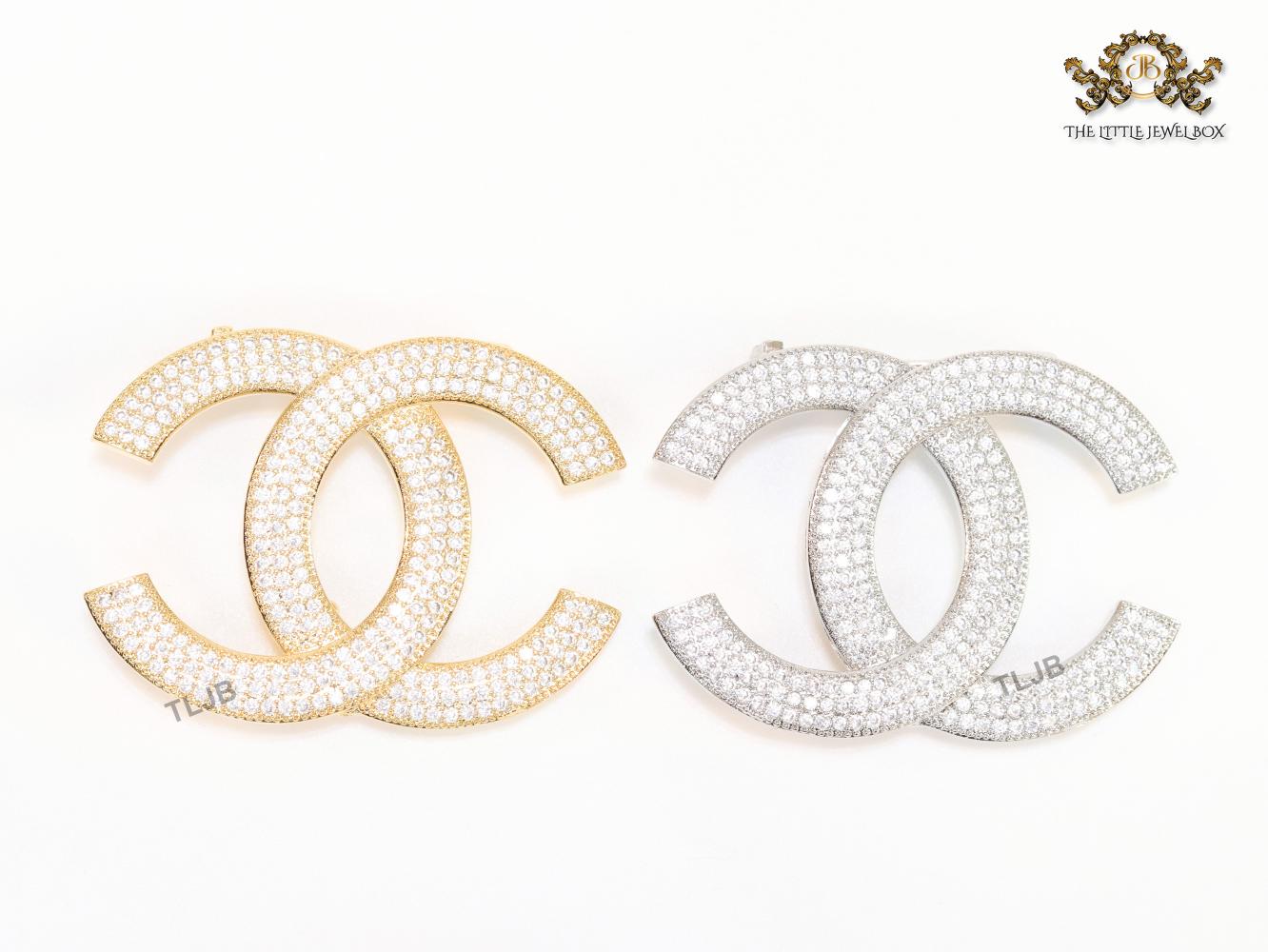 Gold plated twin C brooch with cz