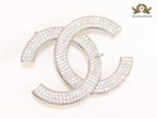 Platinum plated twin C brooch with cz