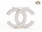 Platinum plated twin C brooch with cz