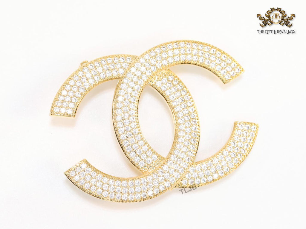 Gold plated twin C brooch with cz