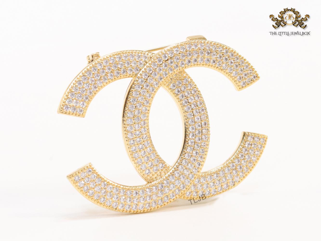 Gold plated twin C brooch with cz