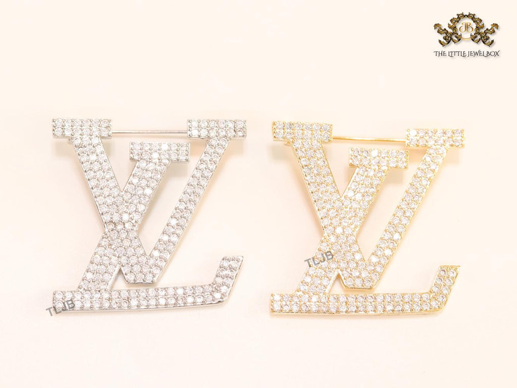 Stylish Land V brooch in cz and rose gold finish