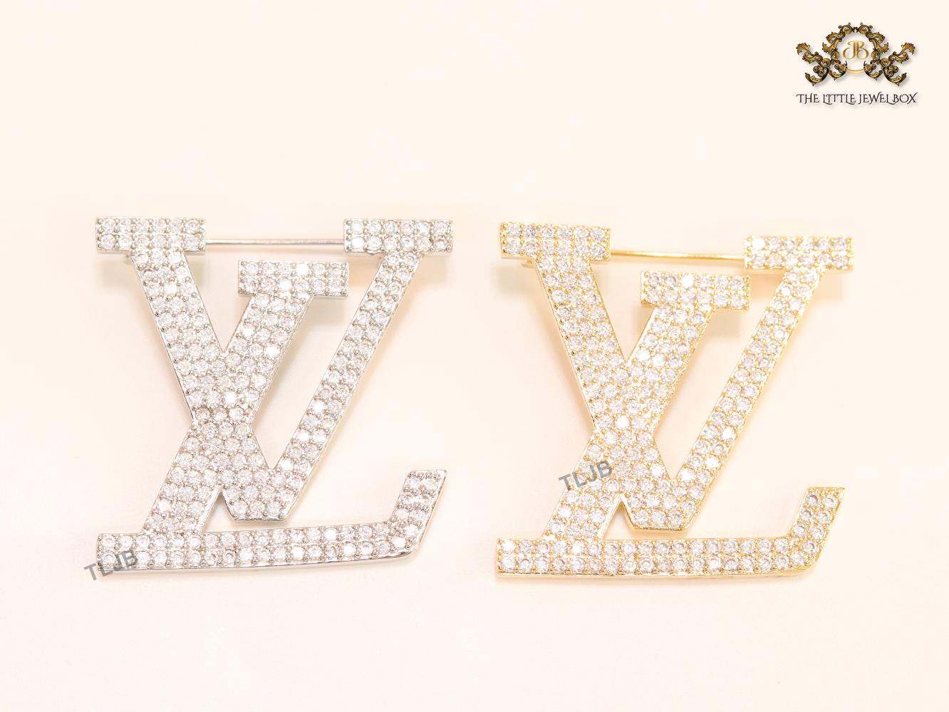 Stylish Land V brooch in cz and rose gold finish