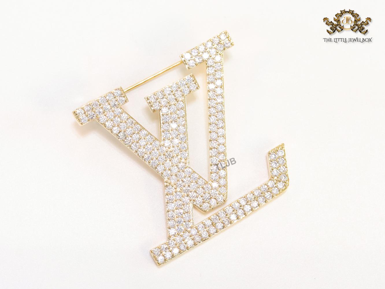 Stylish Land V brooch in cz and rose gold finish