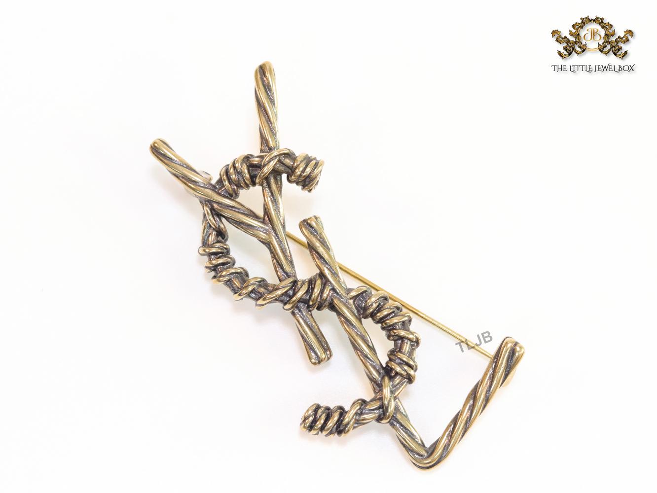Antique gold finish alphabet brooch