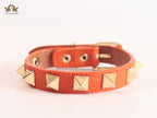 Alphabet V rockstud orange bracelet