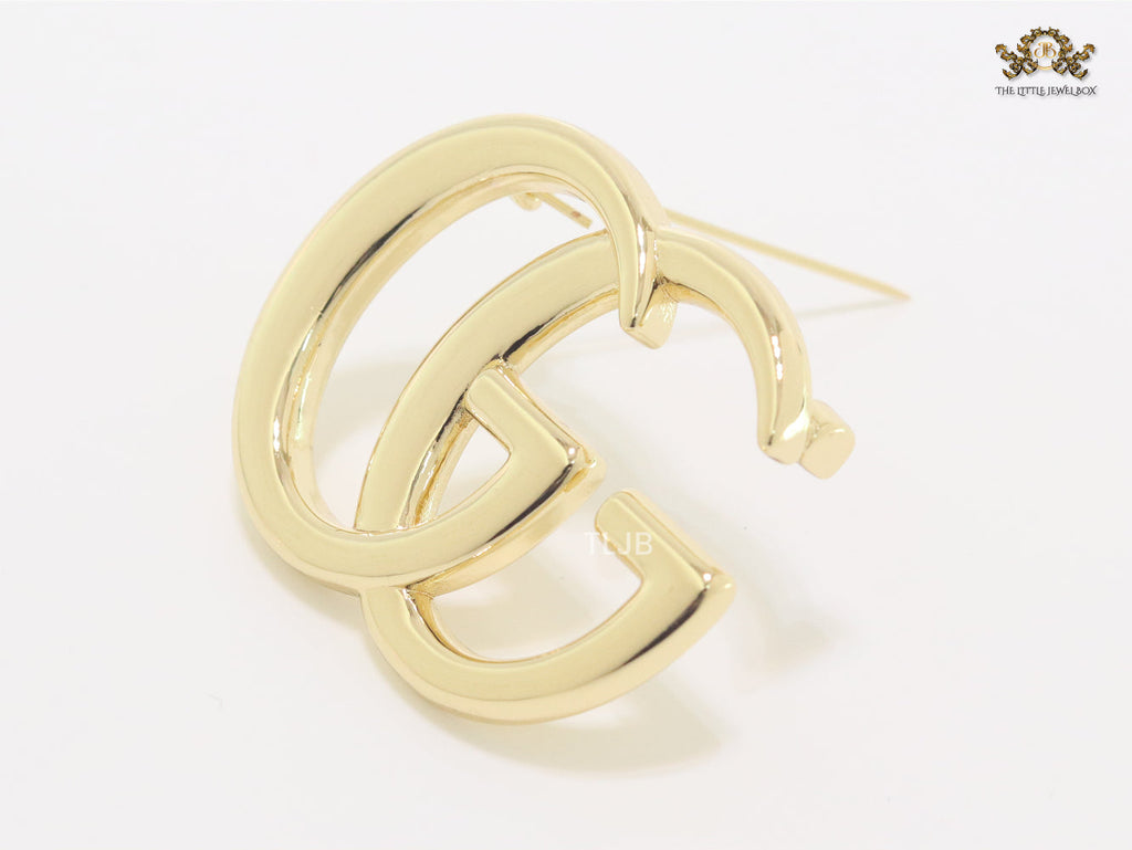 Double G Brooch in shiny Gold