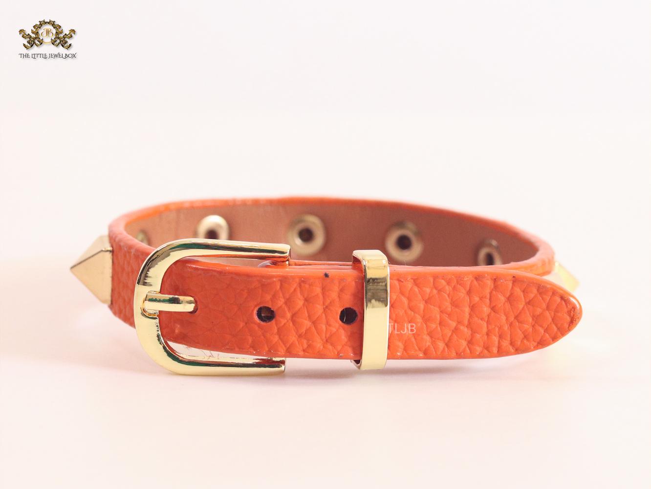 Alphabet V rockstud orange bracelet
