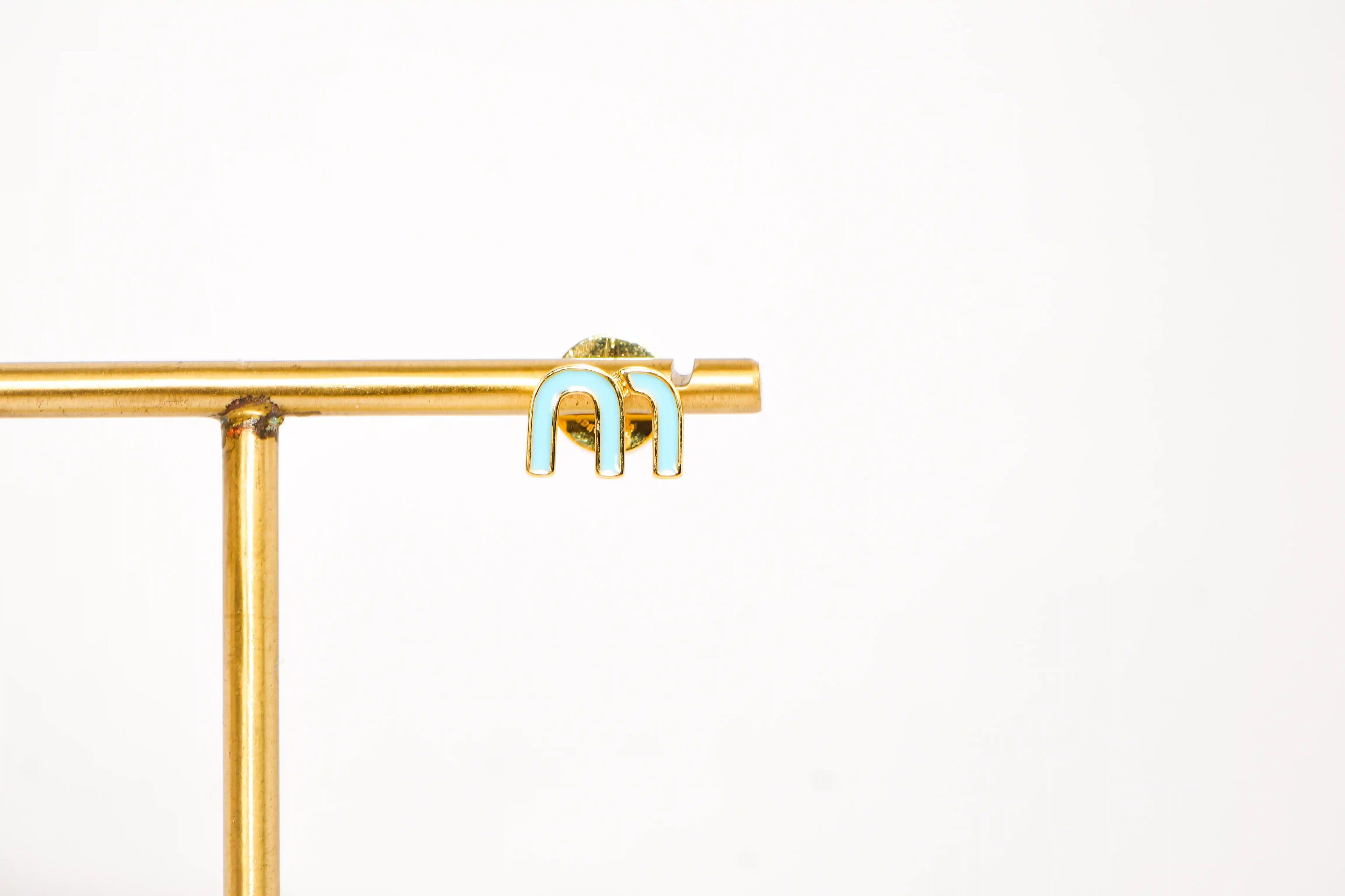 Sky Blue Alphabet M Stud Earrings