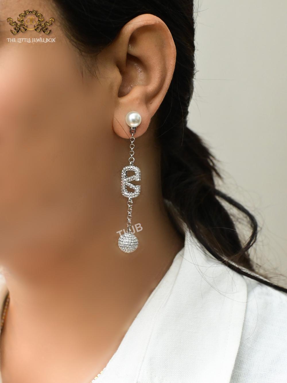 Alphabet V platinum long chain danglers with cz ball