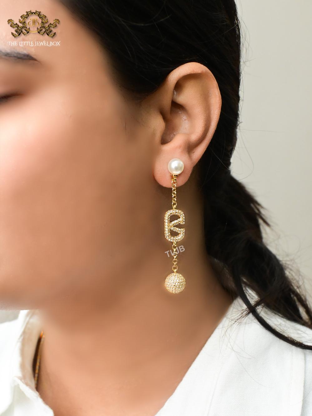 Alphabet V gold long chain danglers with cz ball