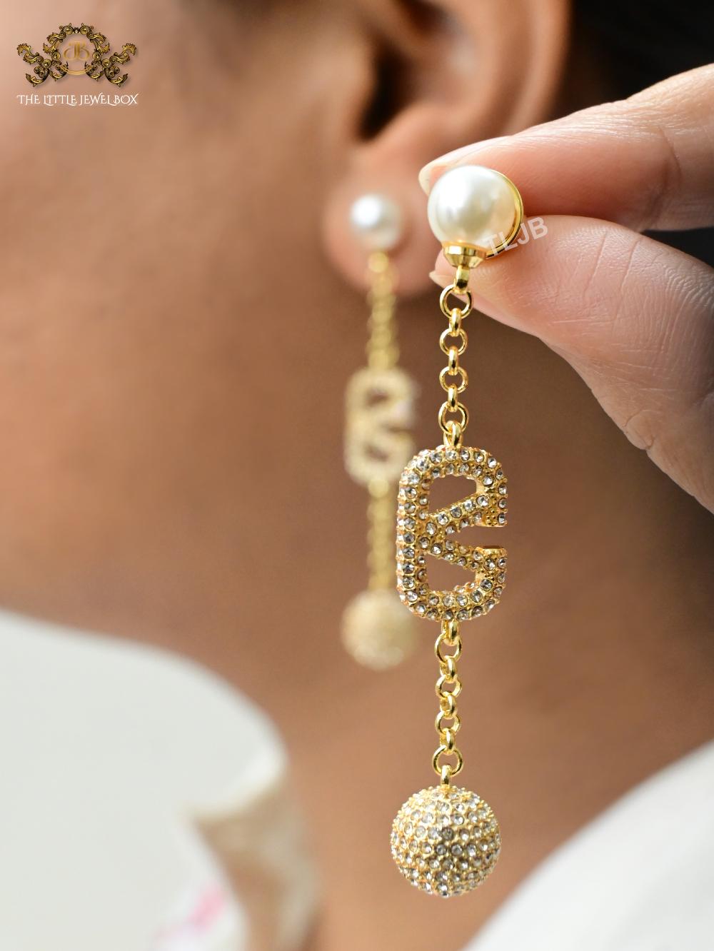 Alphabet V gold long chain danglers with cz ball