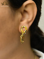 Open V twisted gold earrings