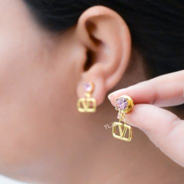 Open V gold and pink stone studs