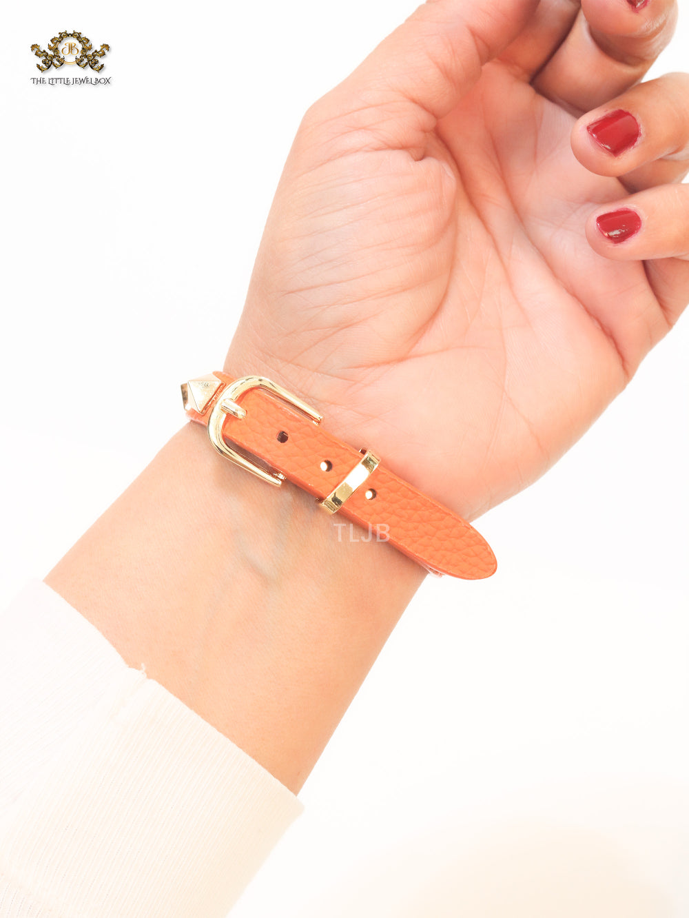Alphabet V rockstud orange bracelet