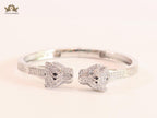 Panther heads platinum plated and emerald bracelet
