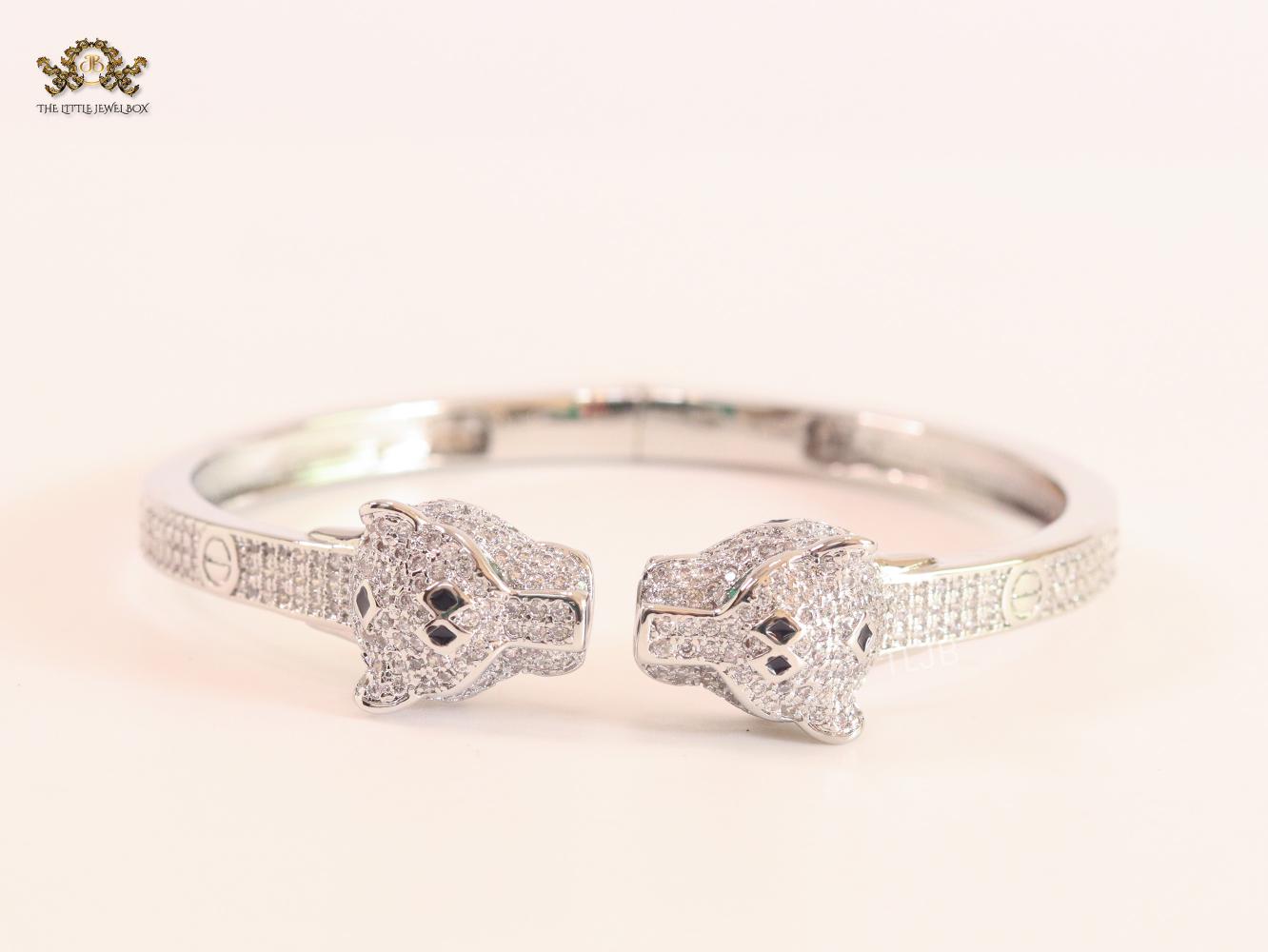 Panther heads platinum plated and emerald bracelet