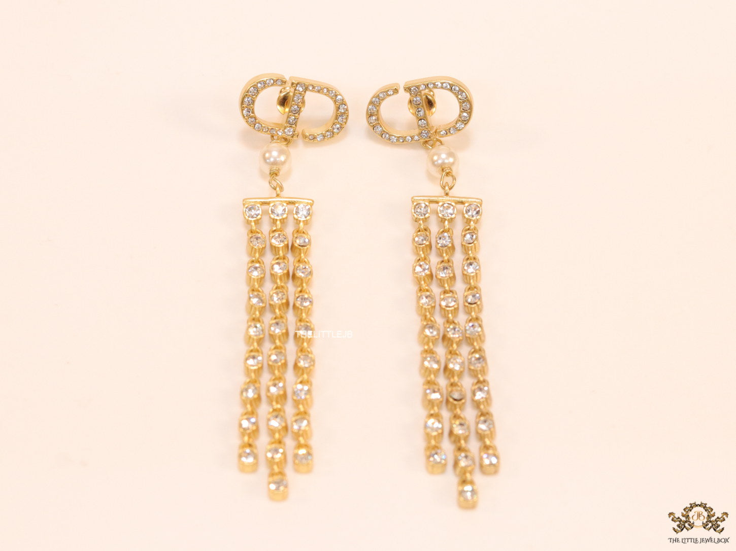 Golden alphabet dangles with long cz tassels