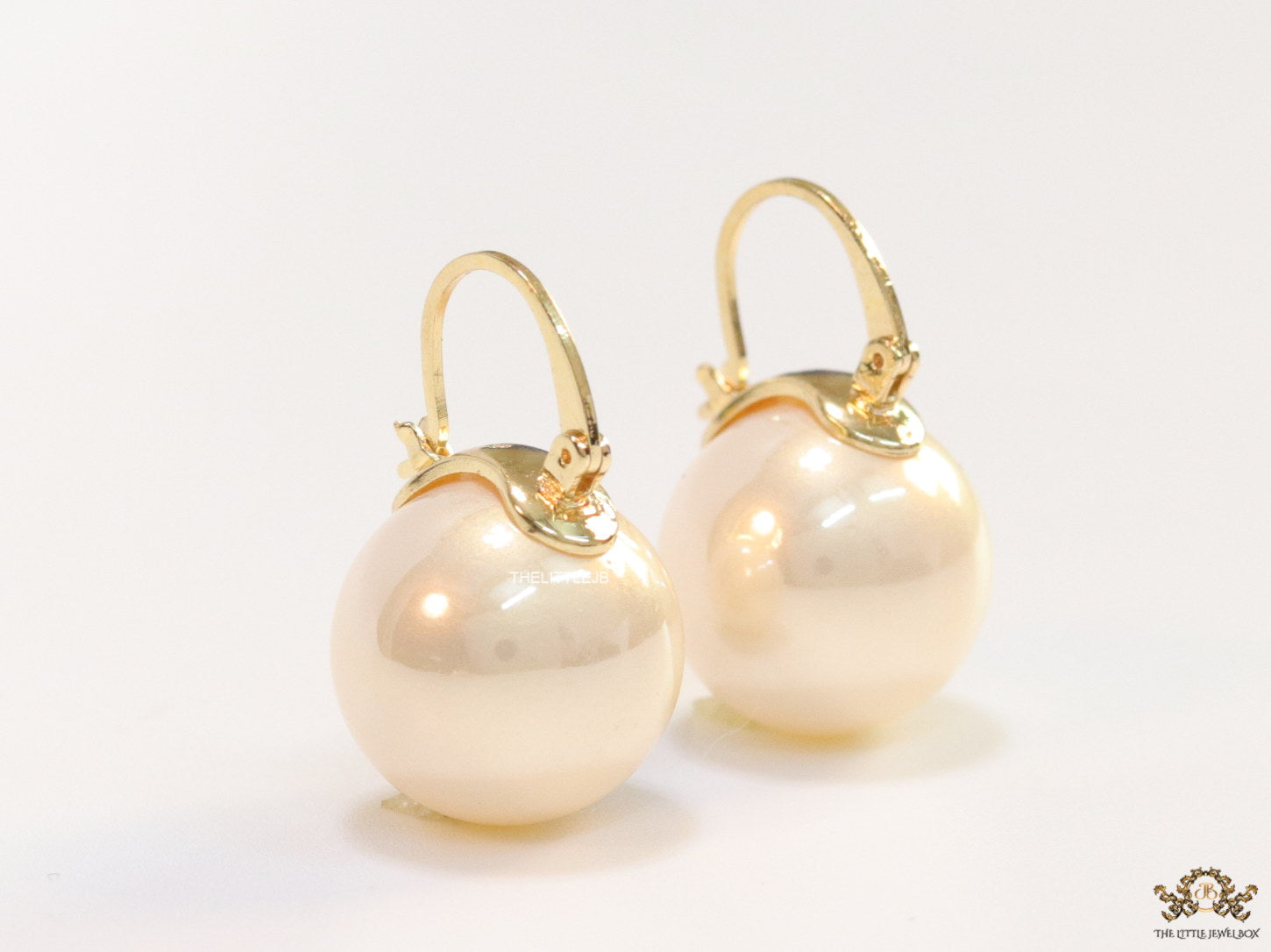 16mm champagne pearl earrings with golden loop